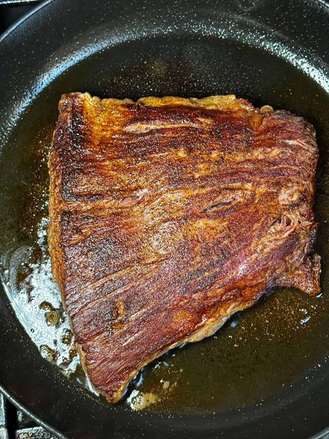 flank steak in a cast iron skillet Cast Iron Flank Steak, Black Bean Rice, Bean Rice, Steak Butter, Mango Salad, Mango Recipes, Creamy Spinach, Steak Seasoning, Lime Dressing