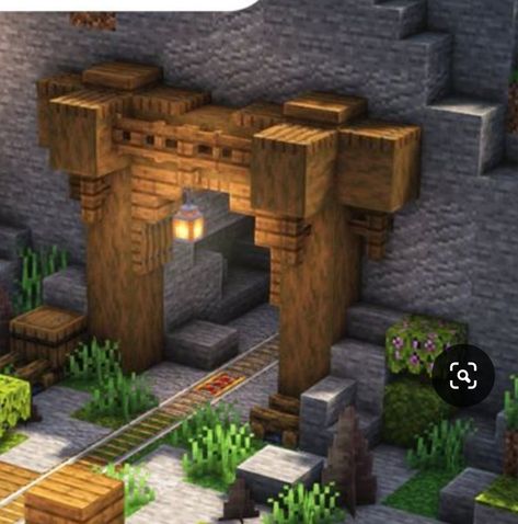 Dark Oak Wall Minecraft, Minecraft Underground Mine Entrance, Minecraft Crypt Ideas, Small Cave House Minecraft, Minecraft Coat Hanger, Minecraft Cave Stairs, Minecraft Center Of Town Ideas, Minecraft Door Frame Ideas, Minecraft Mine Entrances