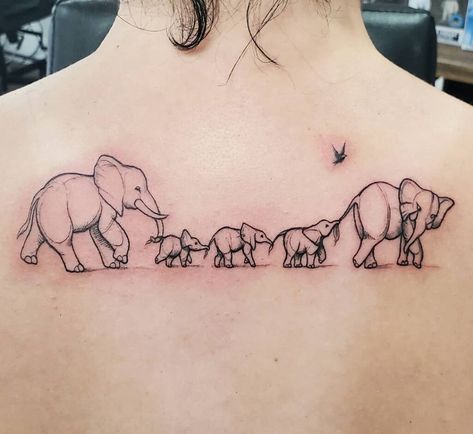 25 Family Tattoo Ideas That Will Melt Your Heart Family Elephant Tattoo Ideas, Elephant Family Tattoo Design, Tattoo Ideas For 3 Kids, Elephant Tattoos Family, Elephant Tattoos Small Family, Family Of Elephants Tattoo, Elephant And Baby Tattoo, Elephant Family Tattoos, Family Of 5 Tattoo Ideas