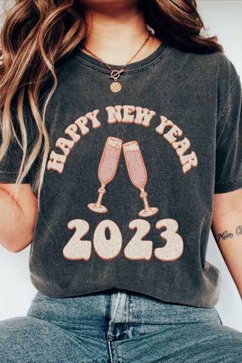 Funny Retro Shirt	Retro Shirt	Happy New Year Shirt	New Year Shirt	New Year Gift	New Years eve	cheers shirt	womens graphic tee	New Years top	2023 shirt	gift for her	cute New Years shirt	oversized shirt New Year’s Eve Shirt Ideas, New Years Shirts 2024, Crew Neck T-shirt For New Year Holiday, Holiday New Year Cotton T-shirt, New Year Champagne, New Year Black Crew Neck T-shirt, Happy New Year Champagne, New Years Eve Shirt, Champagne Shirt