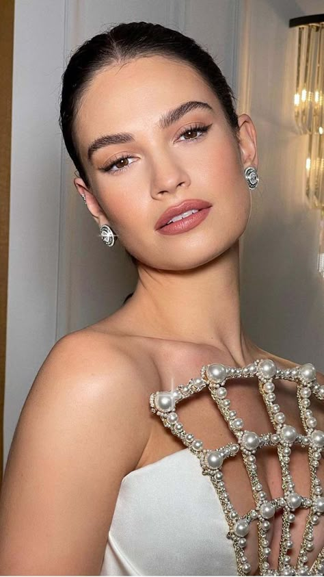 Lily James's "Naked Glitter" Manicure Is a Lesson in Subtle Sparkle Charlotte Tilbury Makeup Looks, Rebirth Photoshoot, Facial Types, Dark Autumn Celebrities, Charlotte Tilbury Looks, Dark Autumn Aesthetic, Soft Glam Bridal Makeup, Night Make Up, Autumn Celebrities