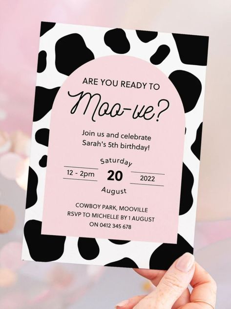 A 5x7  inch birthday party invitation is being held by a hand in front on balloons. The invitation has black and white cow spots as the background and then a pale pink rectangle with curved top edges that holds text. The text says 'Are you ready to moo-ve?' And then includes party invitation details like who's birthday it is, the day, date, time location and RSVP details. Cow Print Birthday, Farm Party Invitations, Country Birthday Party, Farm Invitation, Dance Party Invitations, Farm Birthday Invitation, Farm Animal Party, Country Birthday, Cow Birthday