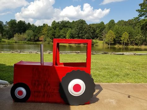 Cardboard Tractor Costume, Diy Cardboard Tractor, Tractor Photo Booth, Cardboard Box Tractor, Old Macdonald Trunk Or Treat, Cardboard Tractor, Box Tractor Cardboard, Tractor Costume, Farm Vbs Decorations