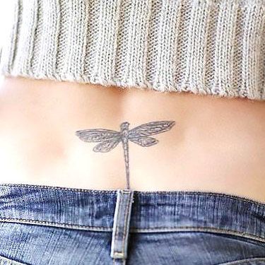 Small Lower Back Dragonfly Tattoo Idea Back Tiny Tattoo, Small Dragonfly Tattoo, Lower Back Tattoo Designs, Dragonfly Tattoo Design, Girl Back Tattoos, Female Tattoos, Tiny Tattoo, Cherry Blossom Tattoo, Dragonfly Tattoo