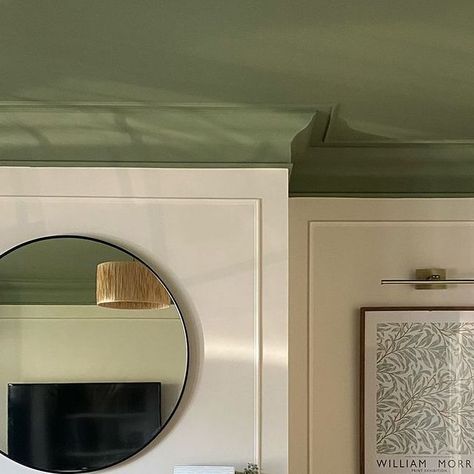 Little Greene on Instagram: "@atthemacs create a statement ceiling using Sage Green, complemented harmoniously by warm neutral walls." Green Walls And Ceiling Bedroom, Green And Cream Panelling, Painted Ceiling Moulding, Sage Ceiling Bedroom, Green Vaulted Ceiling, Green Kitchen Ceiling, Green Living Room Ceiling, Green Accent Ceiling, Hallway Sage Green