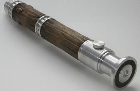 Lightsaber constructer by Eise Swan of titanium and brylark wood (harvested from the Life Tree on Kashyyk) The Star Wars Roleplay Wood Lightsaber, Lightsaber Designs, Lightsaber Ideas, Lightsaber Design, Jedi Costume, Sabre Laser, Star Wars Diy, Star Wars Light Saber, Life Tree