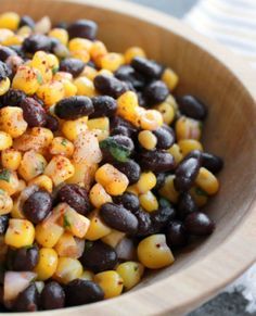 We intended to make this corn and black bean salad recipe as a salsa, but when it came out of the test kitchen, staffers couldn’t refrain from shoveling it in their mouths with a spoon! Hence—it became one our latest favorite salad (main course or side). Corn And Black Bean Salad, Recipes Corn, Corn And Black Bean, Black Bean Salad Recipe, Bean Salad Recipe, Black Bean Recipes, Black Bean Salad, Favorite Salad, Bean Salad Recipes