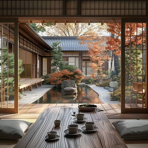 This serene Japanese courtyard house features traditional architecture with sliding wooden doors, tatami mats, and a koi pond. The meticulously designed garden includes vibrant autumn foliage and carefully pruned trees, creating a tranquil focal point. Inside, a low wooden table set with tea utensils invites peaceful reflection. The blend of nature and traditional elements offers a perfect retreat for relaxation and contemplation. House With Garden Inside, House With A Tree Inside, Japanese House In Forest, Dream House Japanese Style, Traditional Japanese Farmhouse, Japanese Garden Inspiration, Japan Inspired Home, Traditional Japanese Home Exterior, House With Tree Inside