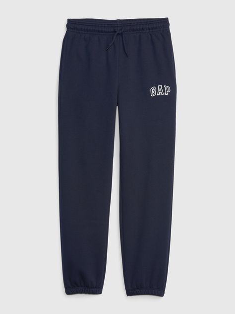 Soft cotton-blend joggers.  Elasticized waist with drawcord.  Front slant pockets.  Gap arch logo at thigh.  Elasticized hem.  Easy, pull-on waist.  Easy through the hip and thigh.  Tapered leg. Dark Blue Sweatpants, Gap Joggers, Gap Sweatpants, Arch Drawing, Fun Family Christmas Games, Wallpaper Removal, Christmas Games For Family, Arch Logo, Dream List