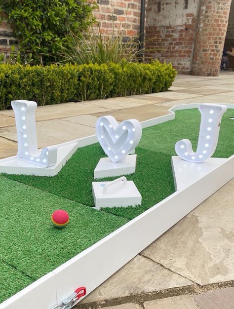 Wedding mini golf featured on our new blog post... What do mini golf, Dr.Seuss and cupcakes have in common? A wedding day of course! Boho Golf Course Wedding, Wedding Mini Golf, Golf Course Engagement Photos, Diy Mini Golf, Golf Wedding Ideas, Golf Themed Wedding, Mini Golf Party, Golf Wedding Theme, Golf Cart Decorations