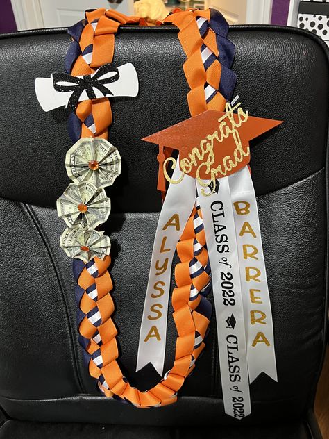 Leis For Graduation Boys, Lei Graduation Ideas, Graduation Lei For Boys, Senior Night Lei, Graduation Lei Ideas, Boys Graduation Leis, Graduation Cords, Warrior Leis With Strings To Shop, Graduation Leis Diy Ribbons