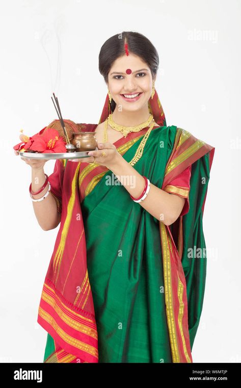 Download this stock image: Bengali woman holding pooja thali and smiling - W6MTJP from Alamy's library of millions of high resolution stock photos, illustrations and vectors. Bengali Woman, Puja Thali, Pooja Thali, Hindu Culture, Diwali Celebration, Hindu Festivals, Durga Puja, Image Processing, Happy Diwali