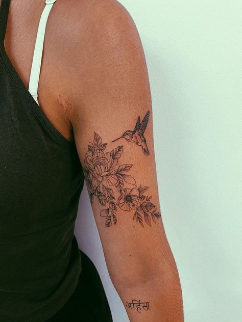 Flowers On Upper Arm Tattoo, Hummingbird And Marigold Tattoo, Hummingbirds And Flowers Tattoo, Hummingbird Wrap Around Tattoo, Outer Bicep Tattoo Women, Western Floral Tattoo Sleeve Ideas, Cute Upper Arm Tattoos For Women, Hummingbird With Flowers Tattoo, Flower Tattoo With Hummingbird