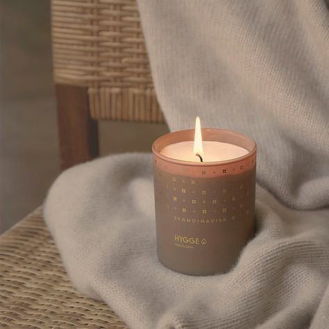 To celebrate the return of the darker months in our 10th anniversary year, we introduce an exclusive limited edition Golden HYGGE Scented Candle. With gold details applied to the pattern motif and packaging, the aesthetic becomes more refined and welcoming. When lit, our popular HYGGE scent emits a more golden autumn glow through the painted glass. Perfect for cosy evenings in the dark. Shop now at skandinavisk.com Dried Apples, Unique Fragrance, Gold Candles, Scandinavian Art, Fragrance Collection, Natural Essential Oils, Gold Details, Glass Design, Cozy House