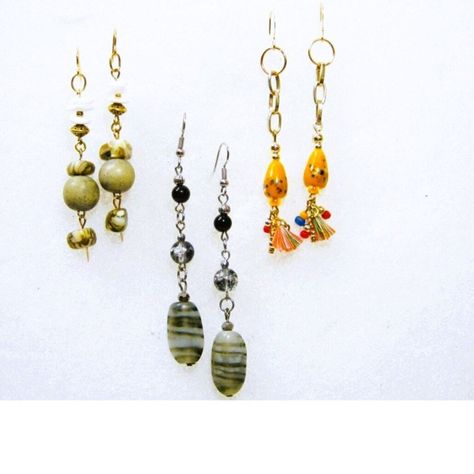 3 pairs handcrafted drop style earrings which i create using repurposed recycled vintage jewelry parts and findings - this set includes 
2 inch lightweight wood beaded drop earrings with MOP shell accents
2 inch unique striped art glass beaded long drops with crackle beaded accents
2.5 inch fun bright art glass beaded drops with small tassel accents Artisan Jewelry Earrings, Striped Art, Gemstone Art, Bright Art, Beaded Drop Earrings, Handcrafted Artisan Jewelry, Beaded Dangles, Style Earrings, Wood Beads