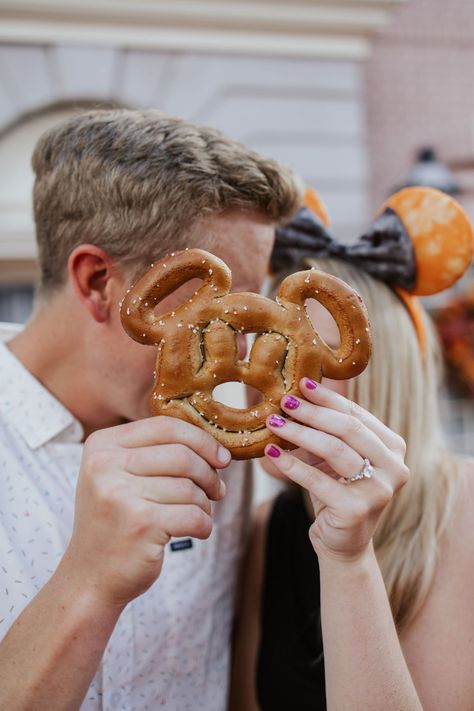 Disney World Engagement Photos / Engaged Couple / Disney Bride / Walt Disney World Photoshoot / Orlando Engagement Photographer / Magic Kingdom Engagement Pictures by Maddy Godt Photography/ Florida Wedding Photographer / Disney Fairytale Weddings / Disney Wedding Photographer / Fall Engagement Session Engagement Photos Disney, Disney Engagement Photos, Disney Engagement Pictures Photo Shoots, Disney Couple Photos, Disney Photoshoot, Disney World Couple Aesthetic, Disney World Engagement Pictures, Disney Resort Engagement Pictures, Magic Kingdom Engagement Pictures