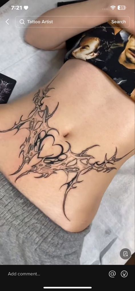 Tattooed Stomach Woman, Flame Stomach Tattoo, Tattoo Ideas Stomach For Women, Pubic Bone Tattoos Ideas, Stomach Word Tattoos, Women’s Stomach Tattoo, Woman Stomach Tattoo, Unique Chest Tattoo Female, Lower Abdomen Tattoo Women