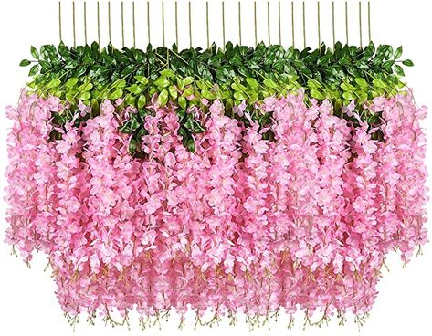 AmazonSmile: Pauwer 24 Pack Artificial Wisteria Vine Ratta Fake Wisteria Hanging Garland Silk Long Hanging Bush Flowers String Home Party Wedding Decor (Pink) : Home & Kitchen Fake Wisteria, Bush Flowers, Indoor Garden Party, Wisteria Vine, Party Wall Decorations, Hanging Vines, Garden Wedding Decorations, Hanging Garland, Leaf Texture