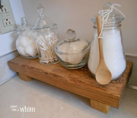 Vintage Farmhouse Bathroom Makeover Farmhouse Bathroom Makeover, Apothecary Jars Bathroom, Vintage Farmhouse Bathroom, Farmhouse Bathroom Accessories, Wooden Riser, Makeover Bathroom, Bathroom Jars, Decoration Vitrine, Bathroom Farmhouse