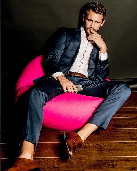 Nick Viall -  I'm not entirely sure why Nick Viall posed on this pink bean-bag chair but neither does he.  "I wasn't not going to sit on this bean bag: @rrayimages" The Bachelor star captioned the shot. Podcast Photoshoot, Pink Bean Bag, Nick Viall, Paradise Love, The Bachelor, Bean Bags, The Shot, Bag Chair, Bean Bag