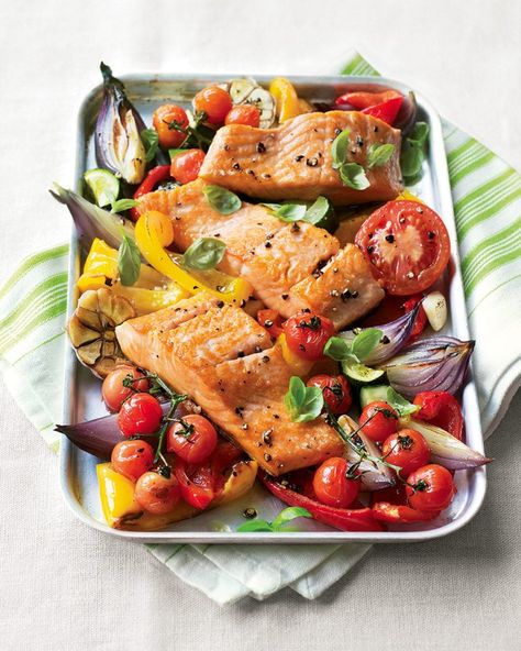 Easy salmon traybake recipe | delicious. magazine Salmon Peppers, Summer Salmon Recipe, Salmon Tray Bake, Salmon Fillet Recipes, Salmon And Broccoli, Pesto Salmon, Tray Bake Recipes, Tray Bake, Easy Salmon