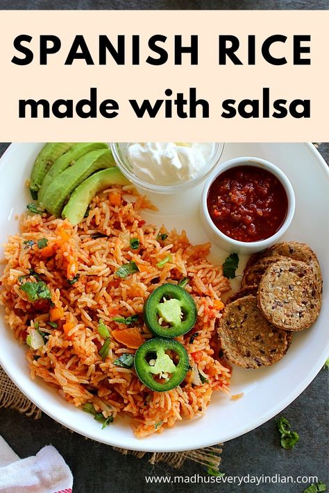 Spanish rice served with avocado, sour cream, salsa, jalapeno and chips Spanish Rice With Salsa, Rice With Salsa, Instant Pot Spanish Rice, Easy Spanish Rice, Spanish Rice Recipe Easy, Spanish Rice Easy, Spanish Rice Recipe, Dinner Recipes Healthy Family, Vegetarian Instant Pot