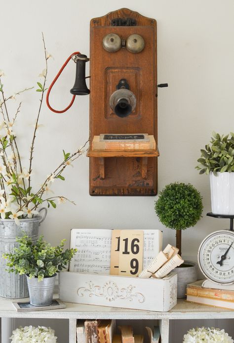 Farmhouse style decor and a vintage telephone Antique Phone Decor Ideas, Vintage Telephone Aesthetic, Vintage Wall Phone, Vintage Home Decor Ideas, Crate Side Table, Vintage Wooden Crates, Family Farmhouse, Sarah Joy, Antique Phone