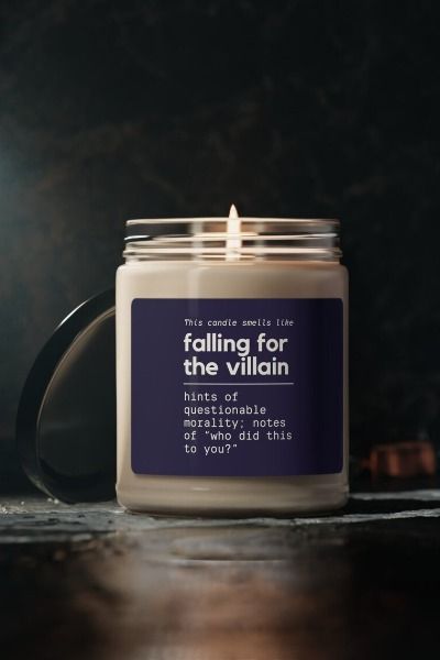 The next time you cozy up with your favorite book, T.V. show, or game, light this candle when the villain's devious smirk starts to make your heart flutter. This candle was made for dark romance enjoyers, villain lovers and morally gray apologists alike. Details: Makes a great gift or treat for yourself. Packed with immersive aromas, these scented candles come in 9oz reusable glass jars. Made with 100% natural soy wax blend, each candle features a 100% cotton wick. Falling For The Villain, Book Merch, Heart Flutter, Book Candle, Bookish Gifts, Fantasy Romance, Container Candles, Gifts For Readers, Scented Soy Candles