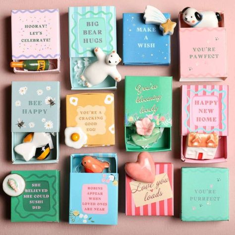 Whether you're looking for a sweet little gift or a special something to remind someone of how great they are, these ceramic tokens are the perfect choice. These tiny colorful matchboxes feature an even tinier ceramic token inside, glazed and glossy and ready to sit on a shelf or in someone's pocket. The top of the box features a different sweet saying for each design! Designed and sourced by a women-owned company based in the UK. Tiny Matchbox Ceramic Token - Flower Made of ceramic Imported Packaging Diy, Best Gift Cards, Diy Workshop, Online Gift Shop, Jewelry Candles, Sweet Quotes, Customizable Gifts, Journal Stationery, Party Packages