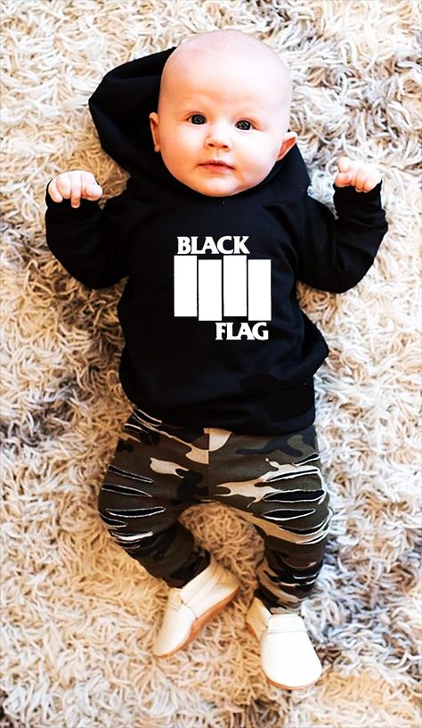 Introducing our Black Flag-Inspired Baby Hoodie - a fan-made tribute that brings the raw energy of hardcore punk to your little one's wardrobe! Crafted from ultra-soft, high-quality cotton blends, this hoodie ensures maximum comfort for delicate skin, whether it's naptime or playtime. The design subtly echoes Black Flag's iconic rebellious aesthetic, making it a standout piece for any mini punk rocker. With practical features like an adjustable hood and a convenient front kangaroo pocket, this hoodie combines style with functionality for everyday wear. Please note: this product is fan-inspired and is not officially licensed by Black Flag. Let your baby embrace the spirit of true punk from day one with this one-of-a-kind keepsake! Rebellious Aesthetic, Punk Baby, Baby Hoodie, Hardcore Punk, Punk Rocker, Black Flag, Rock Legends, Etsy Baby, Punk Rock