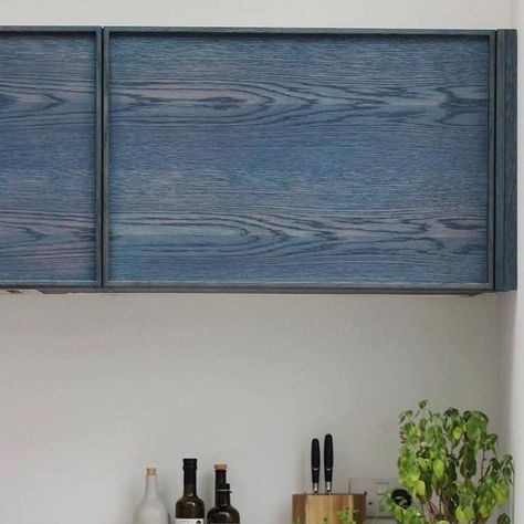 Jon Grant London | Furniture on Instagram: "Throwback to one of our previous kitchen projects: oak veneer fronts with solid oak edges finished in Rubio Monocoat ‘Midnight Indigo’ stain. We love unordinary colour choice by our customers and how the stain has exposed beautiful grain & knots in the wood. If you are looking for something similar and would like to get a quote- get in touch with us at studio@jongrant.london Worktop by @koliqimarbleltd #handmadefurniture #madeinleyton #madeinlond Blue Plywood Kitchen, Blue Stained Wood Cabinets, Stained Plywood Kitchen, Plywood Stain Colors, Dyed Plywood, Plywood Closet, Indigo Interiors, Color Stained Wood, Plywood Furniture Design