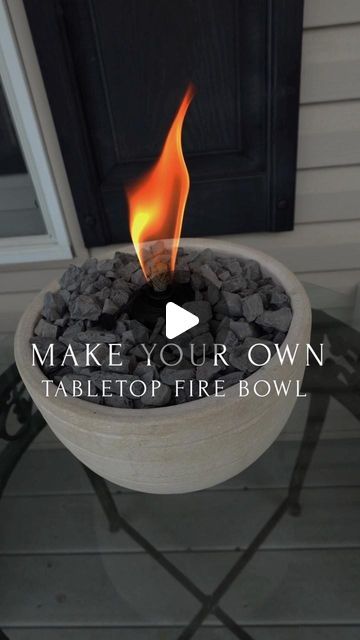 Veronica Ylvisaker | Relatable Mom | Daily Recipes on Instagram: "DIY TABLETOP FIRE BOWL ✨🤩 I used a planter from target, some super cheap rocks, citronella oil and a tiki torch jar 🥰 so simple and the coolest idea!!! Giving the best vibes for summer hangouts with friends while also keeping the bugs away! 💡 everything is linked in my bio! Thanks to my aunt @stefanimachiela for giving me this idea ❤️  DIY, do it yourself, tabletop fire pit, summer vibes, outdoor decor, ideas, bug free" Fire Bowls Outdoor Diy, Diy Torches, Diy Tabletop Fire Pit, Diy Tabletop Fire Bowl, Citronella Torches, Diy Citronella, Tabletop Fire Bowl, Rock Planters, Diy Tabletop