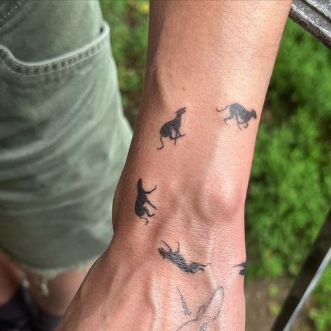 Tattoos Around Forearm, Dogs Running Tattoo, Animal Jaw Tattoo Knee, Non Cheesy Dog Tattoo, Surfs Up Tattoo Movie, Creative Pet Tattoos, Sun Dog Tattoo, Running Greyhound Tattoo, Scruffy Dog Tattoo