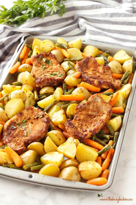 This Easy Pork Chop Sheet Pan Dinner is the perfect weeknight meal idea for busy families - just a few simple ingredients and you've got a whole meal on one pan! Recipe from thebusybaker.ca! #sheetpandinner #easyporkchops #bestporkchops Pork Chop Sheet Pan Dinner, Pork Chop Sheet Pan, Easy Pork Chops, Easy Pork Chop Recipes, Pork Chop Recipes Baked, Pork Chop Dinner, Sheet Pan Suppers, Sheet Pan Dinners Recipes, Pork Dinner