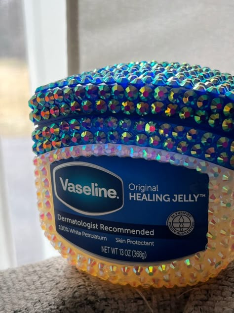 Bedazzeled vaseline, chapstick, it girl, clean girl aesthetic, glitter, crafts, diy, gift ideas Bedazzle Skincare, Bedazzled Stuff Aesthetic, Bedazzled Makeup Products, Things To Bedazzle Diy, Bedazzled Vaseline, Bedazzled Skincare, Mini Chapstick, Vaseline Chapstick, Vaseline Aesthetic