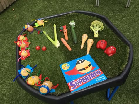 Supertato tuff tray Vegetable Tuff Tray Ideas, Tuff Tray Story Ideas, World Book Day Sensory Play, Superpotato Activities, Supertato Tuff Tray, Superhero Tuff Tray, Book Themed Tuff Tray, World Book Day Tuff Tray Ideas, Book Tuff Tray Ideas