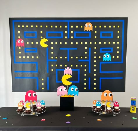 Pac-Man party theme created with cardstock Pac Man Table Cloth, Pacman Theme Party, Pacman Party Decorations, Pac Man Party Ideas, Pacman Party Ideas, Pac Man Party Decorations, Pac Man Trunk Or Treat Ideas, Pacman Decor, Pacman Decorations