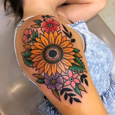 Sunflower Tattoo | Tattoo Ideas and Inspiration Neotraditional Tattoo Sunflower, Burgundy Sunflower Tattoo, Purple Sunflower Tattoo, Traditional Sunflower Tattoo, Floral Tattoo Coverup, Tattoo Sunflower, Dragons Tattoo, Sunflower Tattoo Shoulder, Tattoos Mandala