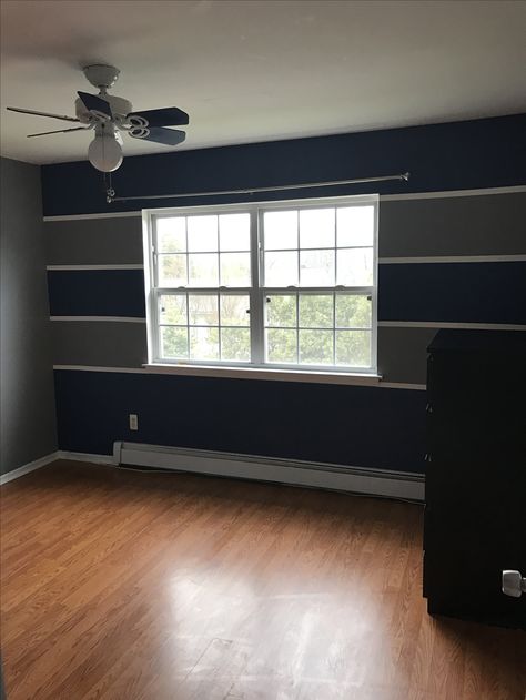 Wall Stripes Paint Ideas Bedroom, Stripe Paint Ideas For Walls Bedroom, Blue Paint Colors For Bedroom Boys, Boys Room Accent Wall, Boys Bedroom Wall Color, Blue Stripe Painted Wall, Blue Paint Colors For Bedroom Boys Behr, Boy Room Accent Wall, Red Boys Bedroom