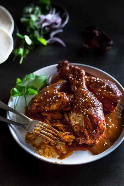 Simple Mexican Chicken Mole Recipe with Dark Chocolate - A rich, aromatic sauce with indulgent dark chocolate and exotic spices, paired with slow-cooked chicken and tortillas. This recipe can be made in advance or frozen for when you need it most! | wandercooks.com #mexicanmole #mexicanchickenmole #mexicanchocolatechicken #mexicanchicken #chickenmole Chocolate Chicken Recipes, Chicken And Tortillas, Mexican Chicken Mole, Chicken Mole Recipe, Easy Mexican Chicken, Mexican Mole, Chocolate Chicken, Mole Recipe, Mexican Stuff