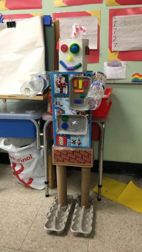 Our class robot made with recyclables! Make A Robot Out Of Recycled Items, Recycled Crafts Robot, Robot Diy Recycle, Cool Recycled Projects, Robot Made Out Of Recycled Materials, Recycle Robot Project Ideas, Diy Robot From Recycled Material, Earth Day Recycle Projects, Recycled Robot Project