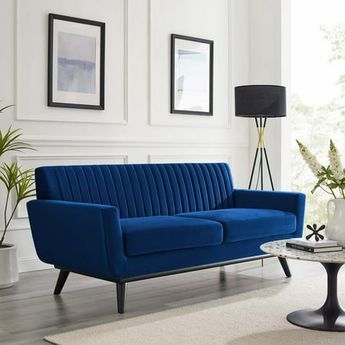 Gently sloping curves and plush seat cushion create a favorite lounging spot. Whether relaxing after a long day at work, settling in with coffee and brunch, or entering a spirited discussion with friends, the Engage Loveseat is a welcome presence in your home. Channel tufting creates eye-catching appeal, adding depth that brings your sitting dcor to center stage. The black painted rubberwood legs and frame offer a solid base for the stain-resistant performance velvet upholstery. Size: 35.5 x 78.5 x 34.5.  Color: Blue. Modern Futon, Tufted Loveseat, Velvet Loveseat, Futon Sofa Bed, Mid Century Sofa, Tufted Sofa, Futon Sofa, Modway Furniture, Velvet Sofa