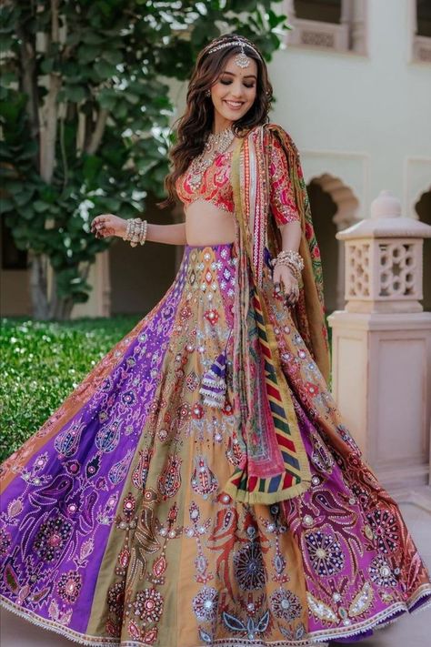 We have been loving multicolour lehengas off late, not just for the mehendi or the haldi, but even for the wedding, and we love the brightness and vibrance they bring. Multicoloured lehengas are trending right now, and here are some that we are crushing on currently! Mehndi Hairstyle, Mehndi Look, Haldi Outfit For Bride, Mehendi Lehenga, Mehandi Outfits, Hairstyle Indian, Garba Outfit, Mehndi Outfit, Mehendi Outfit