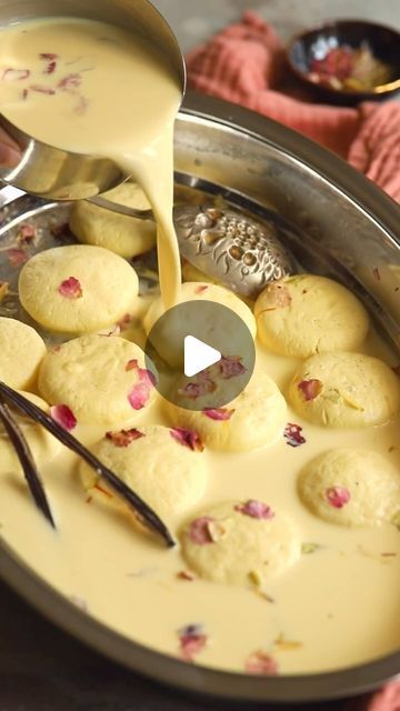 96K views · 5.3K likes | Sanjana Modha on Instagram: "Vanilla Rasmalai you can make at home. A step-by-step process for anyone who loves this Indian dessert. The vanilla milk is so good you could drink it hot or cold, all by itself.  Recipe link for the full video & measurements is in my bio for a limited time. Grab it before it’s gone.  Here’s my take on the traditional dessert, with a non-traditional addition of vanilla.  Initially, making Rasmalai felt like an intimidating process. I messed it up again and again, until one day, I didn’t. Spongy chhena, sweet milk and the tiny screams from the vanilla beans in the cupboard. They were begging to be included and went in as soon as I was sure my recipe had been perfected.  Sincerely yours, The Patron Saint of Rasmalai 🖤  #vanilla #rasmalai How To Make Rasmalai Recipe, Indian Sweets Videos, Rasmalai Recipe Video, Rasmalai Recipe, Sweet Milk, Vanilla Milk, Indian Dessert, Vanilla Beans, Indian Dessert Recipes