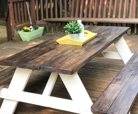 A 98.00 unfinished picnic table from LOWES turned beautiful in 3 easy steps. 1. Sand 2. Stain the top and benches 3. Paint the rest. I used weather proof stain and paint from Home Depot Stained Picnic Table, Picnic Bench Ideas Painted, Outdoor Wooden Tables, Stain Picnic Table, Paint A Picnic Table, Stained Picnic Table Ideas, Picnic Bench Painted, Picnic Table Stain Ideas, Picnic Table Paint