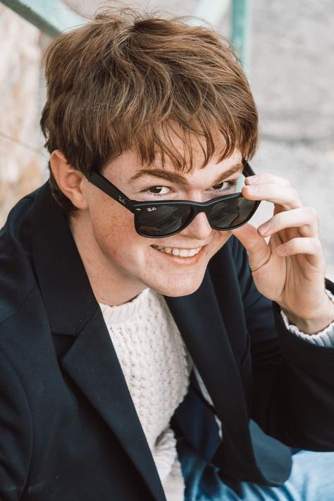 2023 senior guy photo shoot cool dude sunglasses downtown urban Person With Sunglasses Reference, Holding Glasses Pose Reference, Sunglasses Pose Reference, Holding Glasses Pose, Sunglasses Drawing Reference, Glasses Pose Reference, Guy With Sunglasses, Sunglasses Reference, Adjusting Glasses