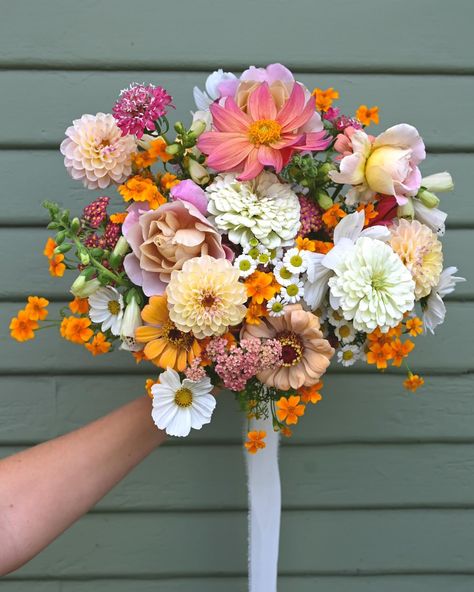 One of my favorite bouquets to date. I absolutely love when brides give me creative liberty when it comes to palette and design. As my fall growing season kicks off, I can’t help but see the budding potential in all my little sprouts and shoots. Can’t wait for so much more beauty and abundance in 2025 💕 @beeworthyfarms @greenyflowergardenfarms #bridalbouquet #sandiegowedding #sandiegoweddingflorist #weddingflowers #sustainablefloristry #cutflowergarden Dahlia Zinnia Bouquet, Colorful Wedding Floral Arrangements, Flower Bouquet Recipe, Ranunculus Bridesmaid Bouquet, Wildflower Bouquet Wedding, Spring Flowers Bouquet, Zinnia Bouquet, Dahlia Wedding Bouquets, Bouquet Wildflower