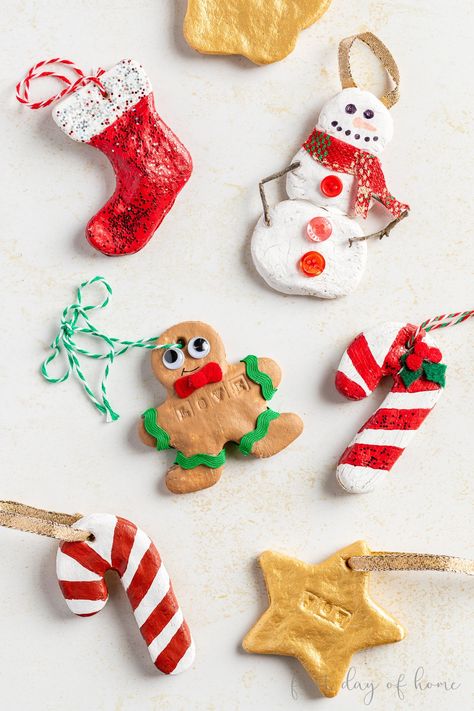 This easy recipe for salt dough ornaments is the perfect Christmas craft for kids! You need only 3 ingredients, and you can customize your DIY ornaments with paint, glitter, handprints, thumbprints, stamps and more. Choose to bake the dough or let it air dry (no-bake option). You'll want to make salt dough ornaments for every holiday! #saltdoughornaments #saltdough #kidscrafts #christmascrafts #firstdayofhome Colored Salt Dough Ornaments, Salt Dough Xmas Ornaments, Saltdough Diy Christmas, Salt And Flour Ornaments Kids, Salt Dough Toddler Ornaments, Salt Dough Tree Ornaments, Diy Baked Ornaments, Kids Salt Dough Ornaments, Diy Ornaments Toddlers