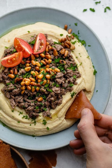 My Lebanese Hummus with Ground Beef is a recipe I learned from my parents. It's simple and authentic and topped with ground beef and pine nuts! | Hummus Dips | Lebanese Snacks | Appetizers | #dips #hummus #lebanesefood #feelgoodfoodie Easy Hummus Recipe, Creamy Hummus, Ground Beef Recipe, Middle East Recipes, Ground Beef Dishes, Homemade Hummus, Ground Beef Recipes For Dinner, Beef Recipe, Lebanese Recipes