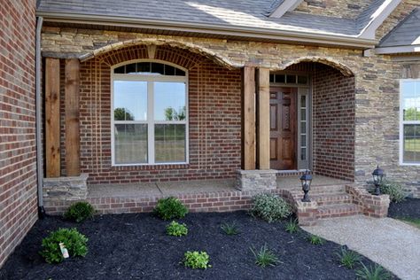 Rustic columns and red brick Farmhouse Reno, Front Porch Stone, Brick Ranch Houses, Front Porch Posts, Red Brick House Exterior, Brick House Designs, Southern Farmhouse, Traditional Porch, Cedar Posts